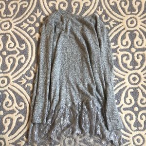 Grey mid length sweater with lace detail on bottom